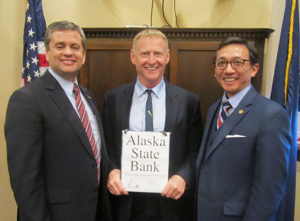 Read more about the article Representatives Chris Tuck and Scott Kawasaki with Charles Duncan after passing HB376 Alaska State Bank from the House Labor and Commerce Committee.